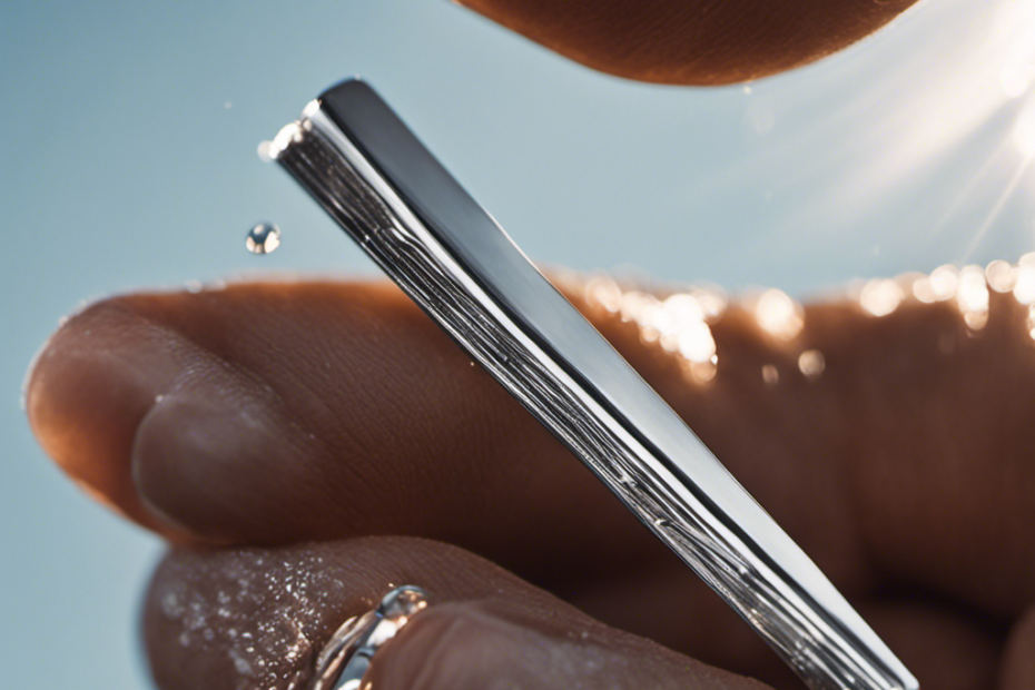 -up image of a person's hand holding a shiny silver razor, gliding effortlessly across a smooth scalp, while tiny droplets of water glisten in the sunlight, capturing the precise moment of achieving a perfectly bald head